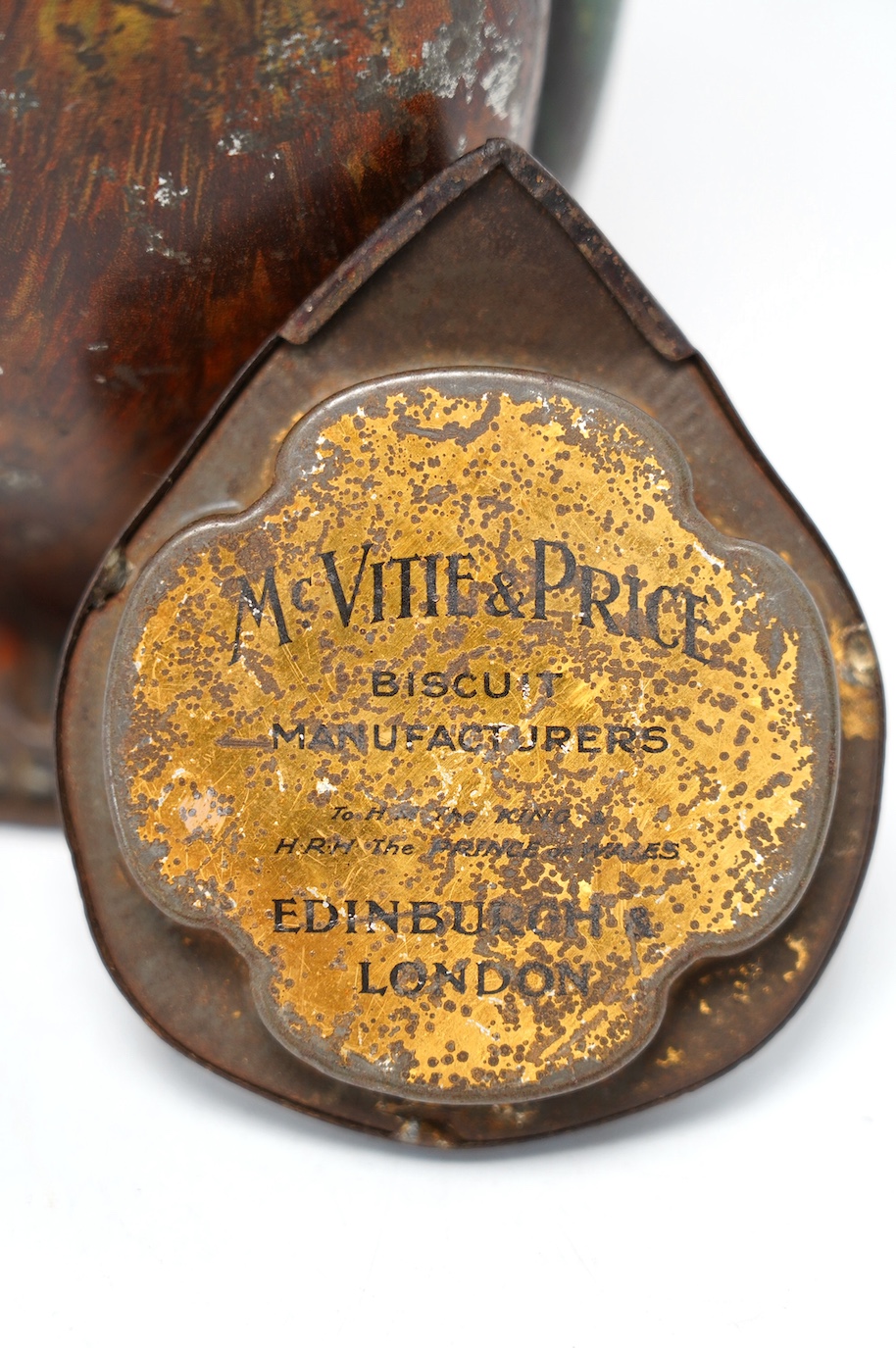 An early 20th century McVitie & Price novelty biscuit tin, modelled as a Martin Brothers wally bird, 24cm high. Condition - fair
